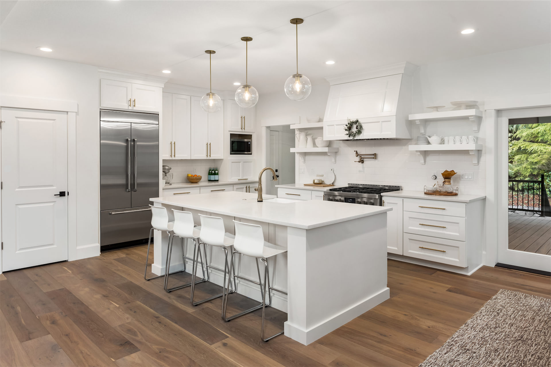 Bright custom kitchen with a large island, built by a UBuildIt owner-builder client